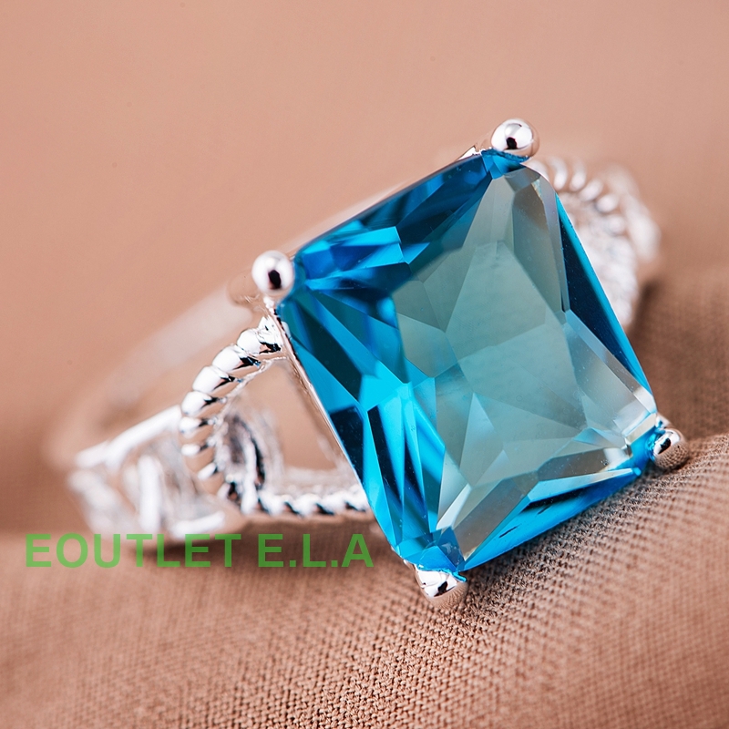 EMERALD CUT SKY BLUE CZ SILVER DRESS RING-size 8